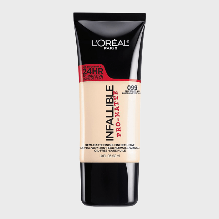 A tube of L'OrÃ©al Infallible Pro-Matte foundation with a black cap and beige body, labeled for 24-hour wear, set against a plain backdrop.