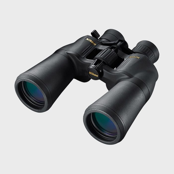 Binoculars resting on a plain background, featuring 