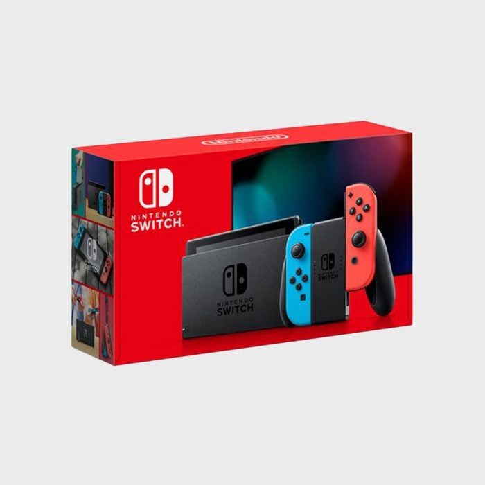 Nintendo Switch console box displays device and controllers in vibrant red packaging, showcasing product design and features.