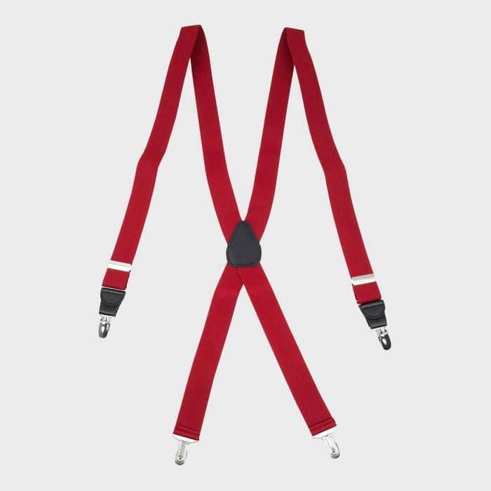 Red suspenders lie flat against a plain background, forming an X-shape with metal clips at the ends for attachment.