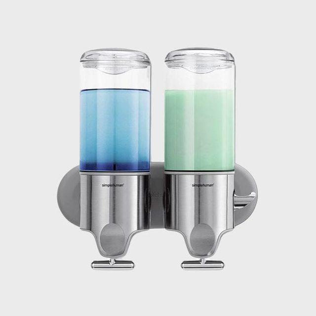 Dispenser holds blue and green liquid, mounted on a silver wall bracket; labeled 