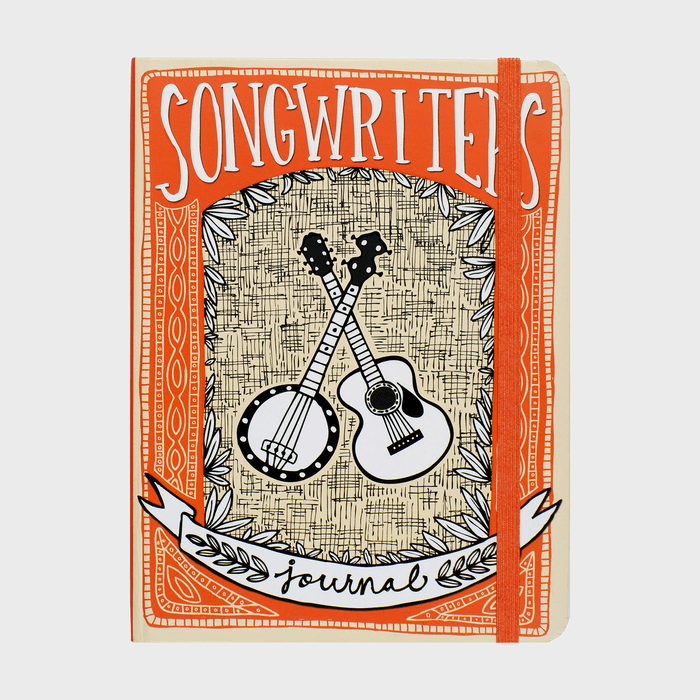 Journal showcases crossed banjo and guitar illustration, labeled 