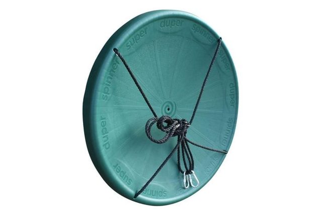 A round green disc has black ropes knotted at its center, with embossed text 