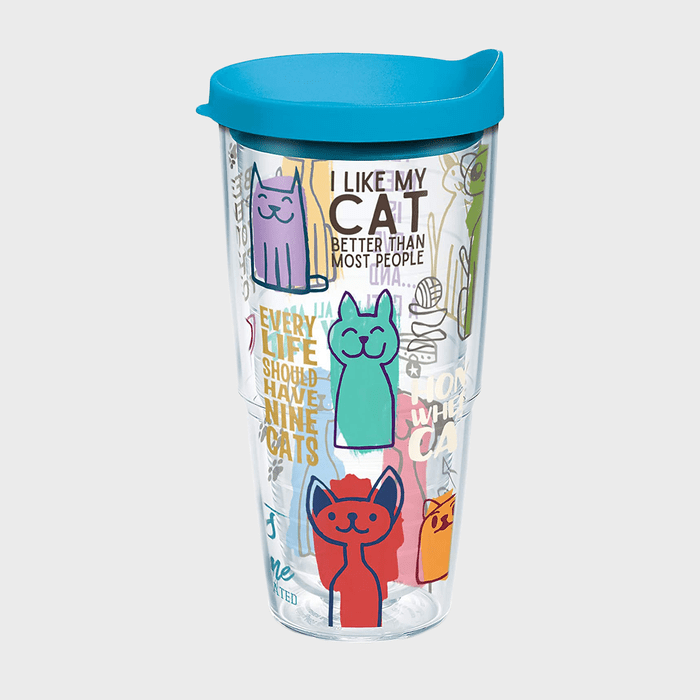 Tumbler displays cartoon cats and text, 