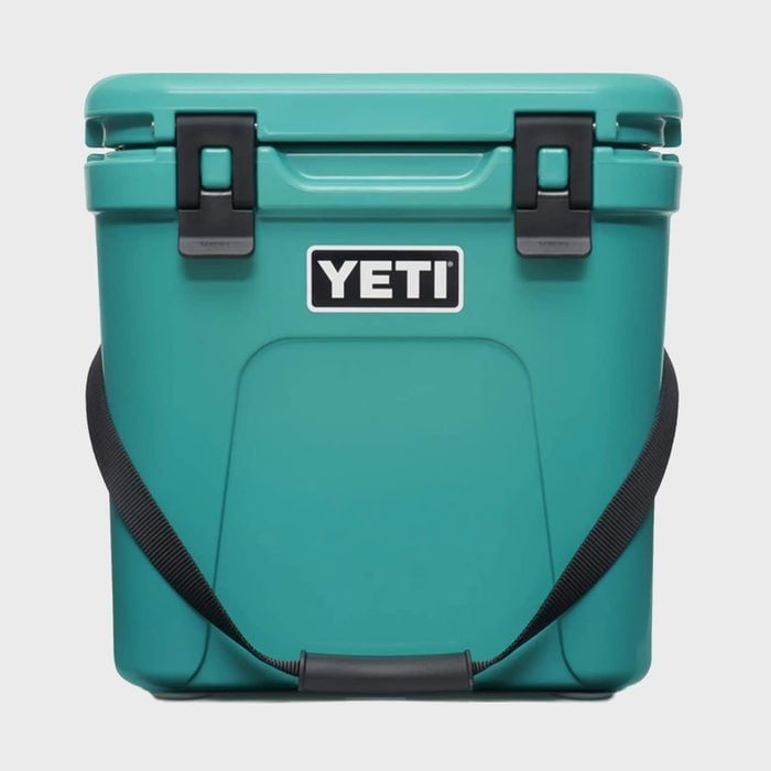 Cooler with black latches and handle, displaying 