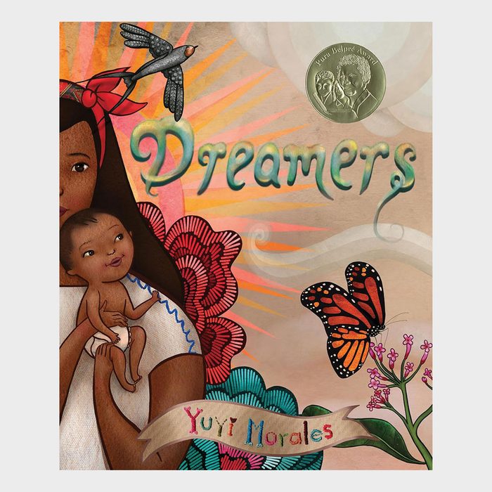 A mother holds a baby amid vibrant patterns; bird and butterfly nearby. Text: 