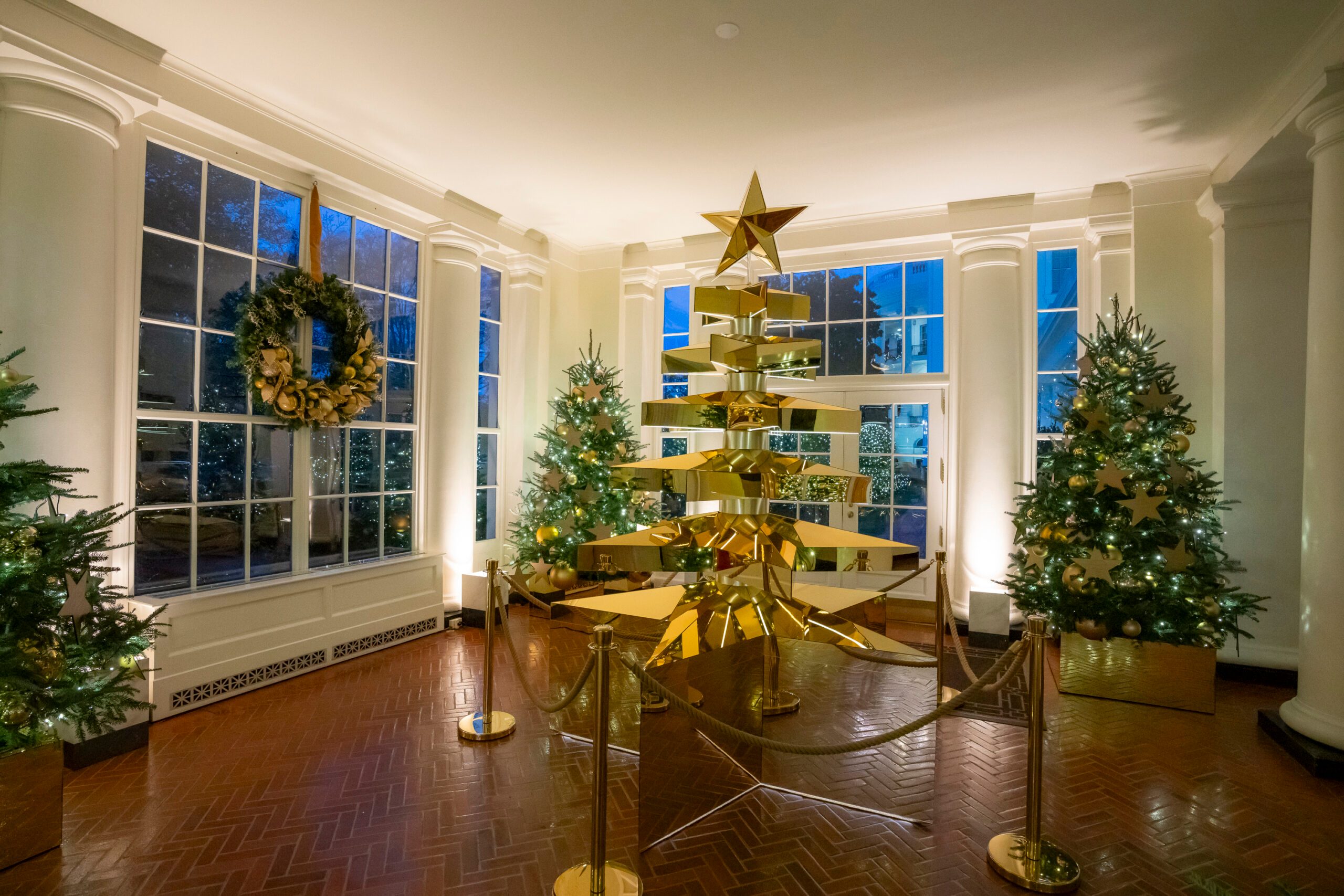 Gold star tree in the The East Wing landing of the White House is decorated for the holidays, Sunday, December 1, 2024.