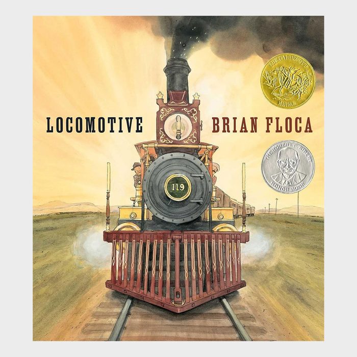 A steam locomotive moves forward on tracks in an open field under a sunset sky. Text reads 