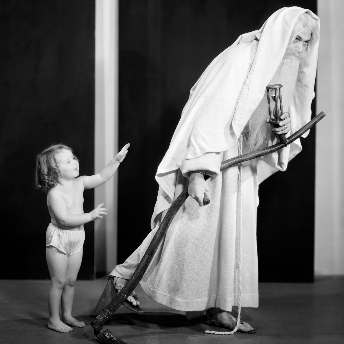 New Year Toddler Baby Girl In Diaper Bidding Goodbye To Old Father Time