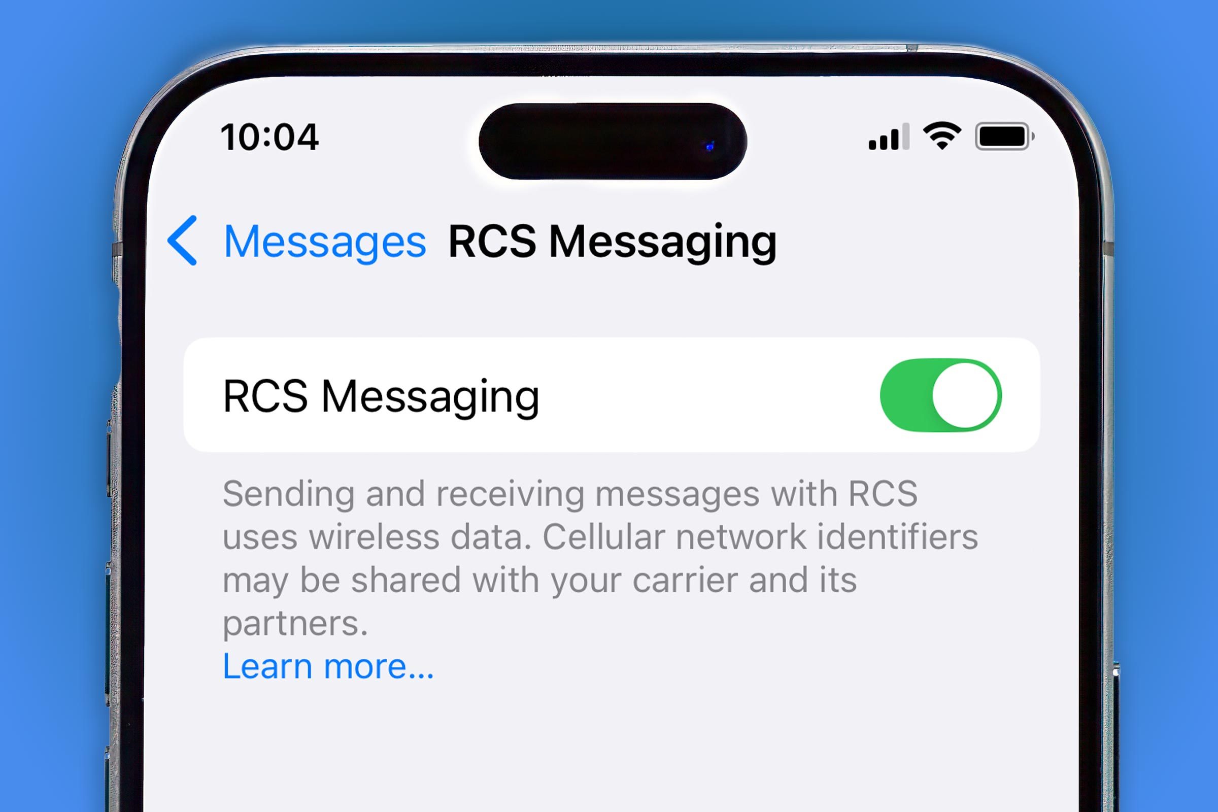 An iPhone on a Blue background with the "RCS Messaging" settings screen toggled to "on"