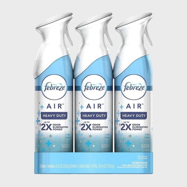 Three spray bottles stand together, labeled 
