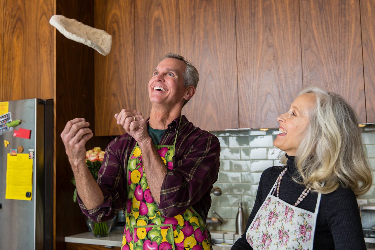 110 Romantic And Fun Date Ideas To Spark A Connection - couples making pizza at home