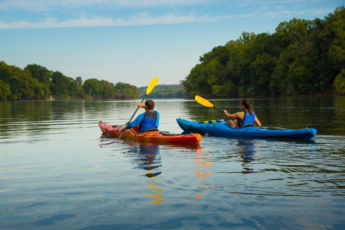 110 Romantic And Fun Date Ideas To Spark A Connection - couple kayaking in river