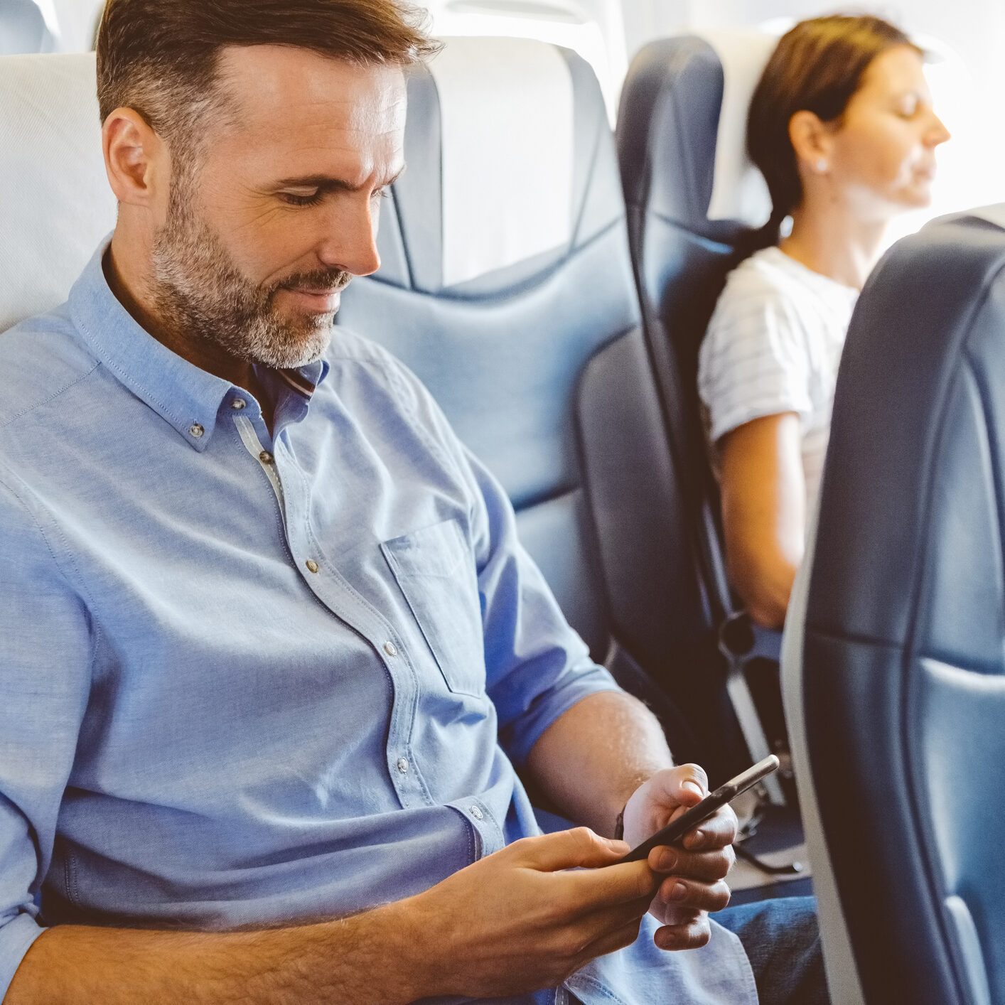 Sitting Next to an Empty Middle Seat On an Airplane? Here’s What <i>Not</i> to Do