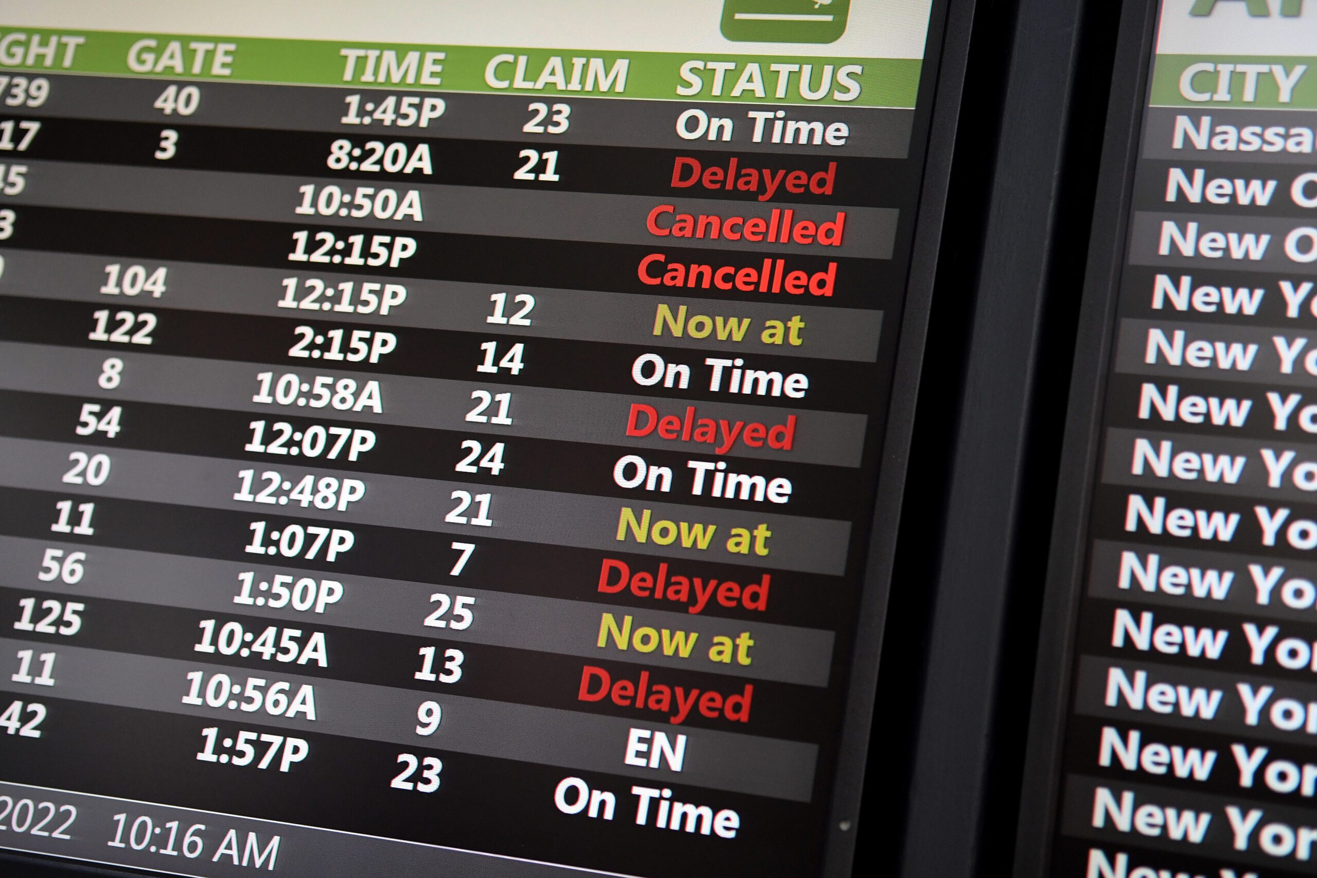 Flight departure board at an airport showing mostly cancelled or delayed flights