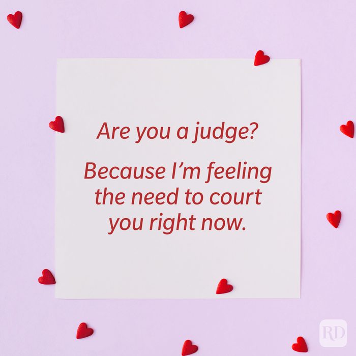 Valentine’s Day Pickup Line on paper background with scattered hearts around it background