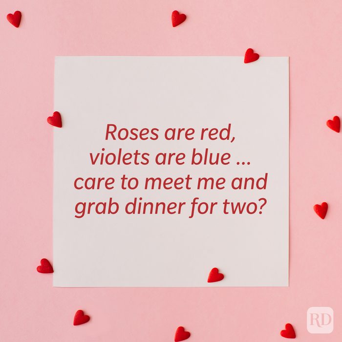 Valentine’s Day Pickup Line on paper background with scattered hearts around it background