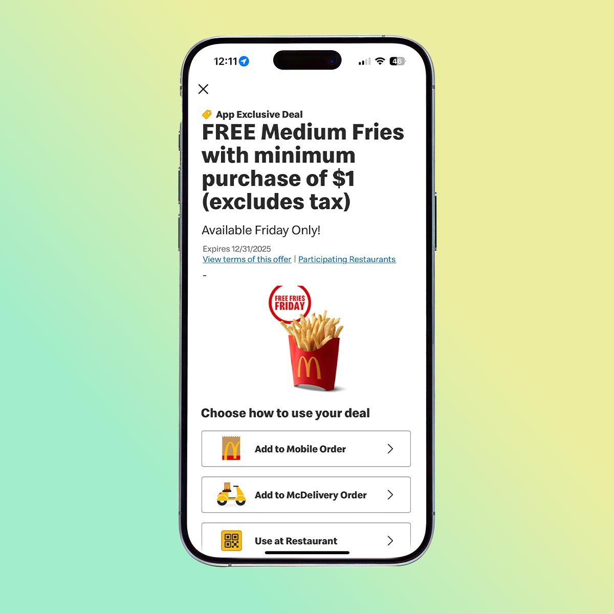 iPhone with the McDonald's app open to the Friday free french fry promotion, on a yellow and green background