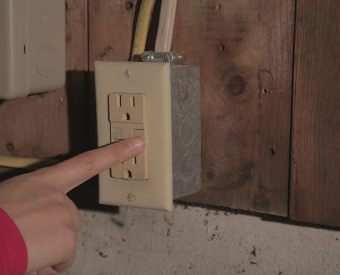 Pressing GFI Test Button