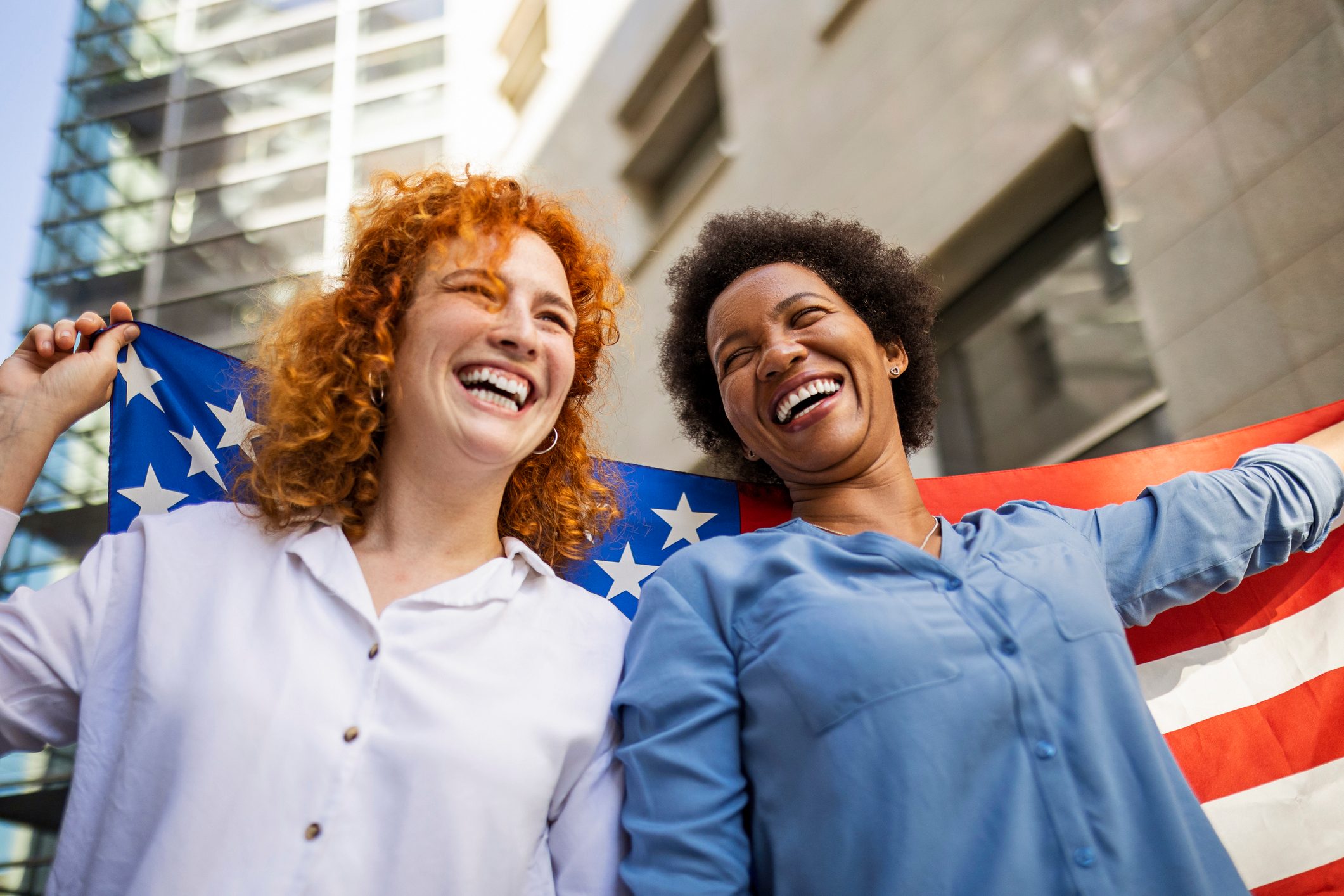 Women celebrating with American flag