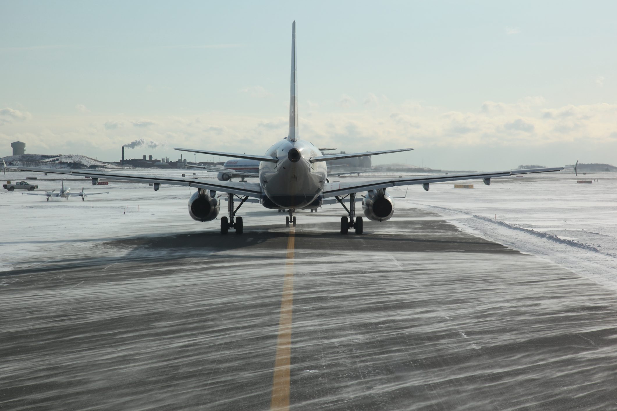 Airplane line up in snowy