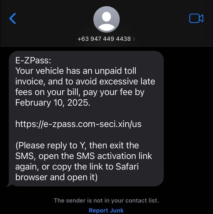 Close-up of a scam text from a fake toll company