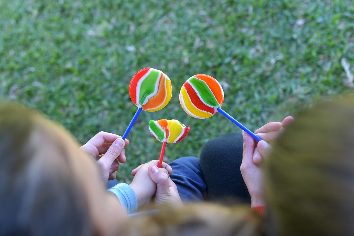 kids enjoying lollipops