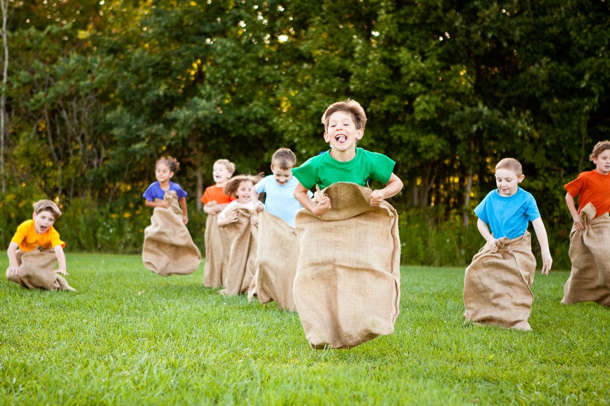 kids enjoying potato sack race