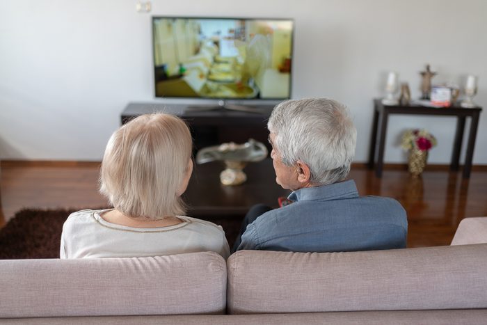 old couple watching tv