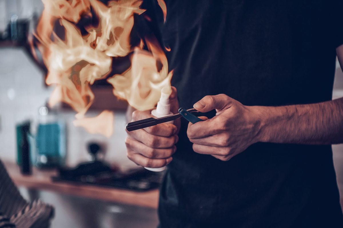 hairdresser working with fire