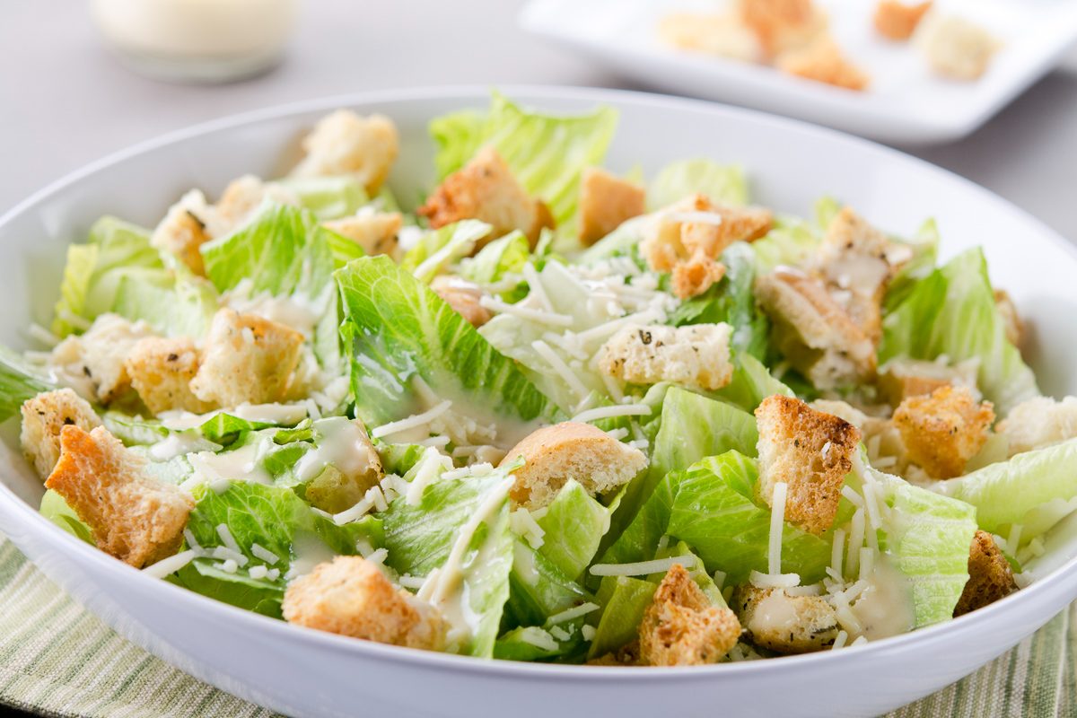 bowl of caesar salad with croutons