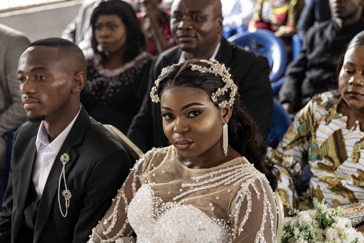 congolese bride sitting next to the groom