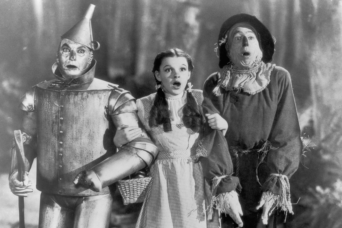 The Tin Man (Jack Haley), Dorothy (Judy Garland) and the Scarecrow (Ray Bolger)