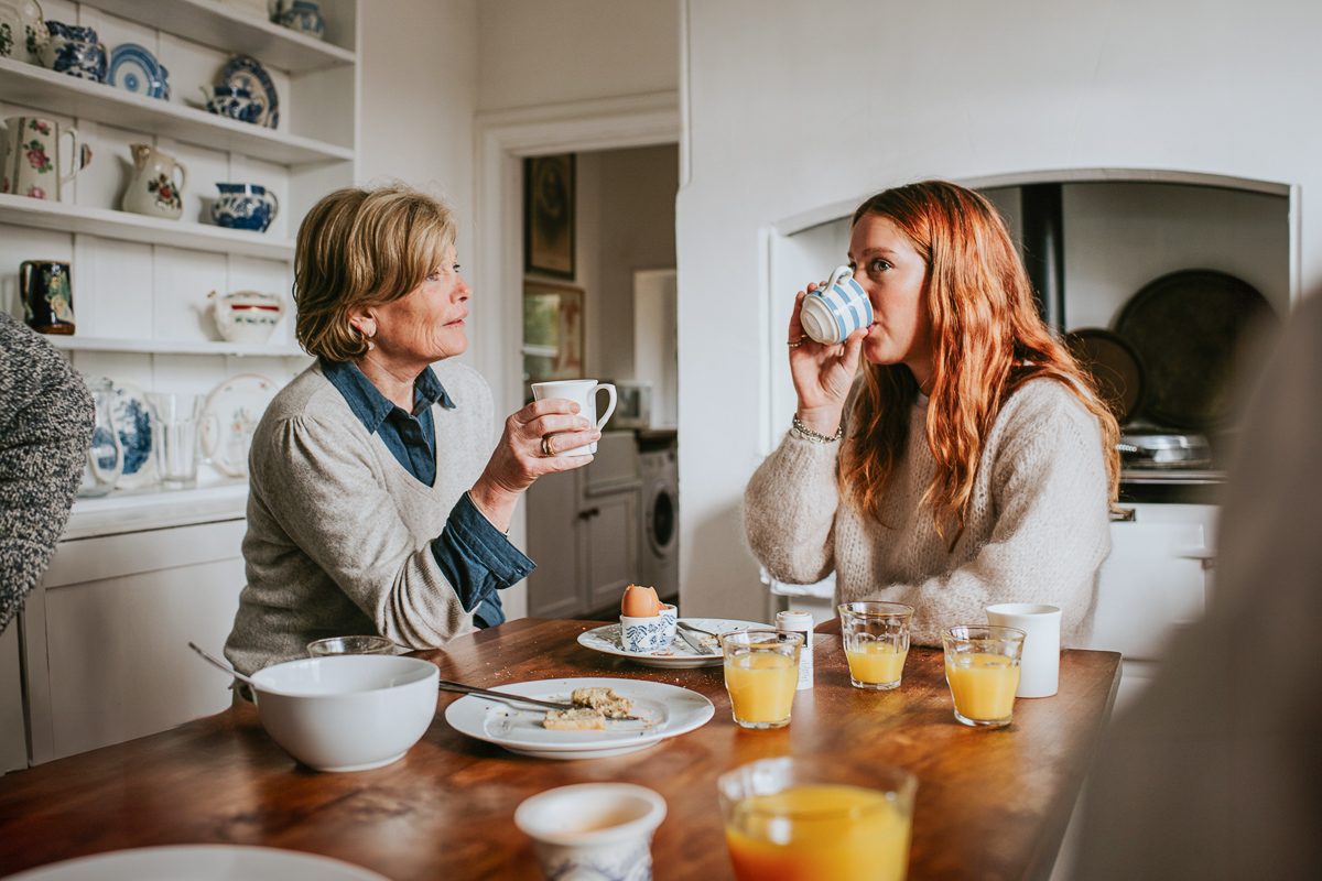 mother and daughter having a tea party