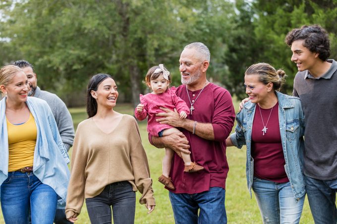 Multi-generation family, looking at baby girl