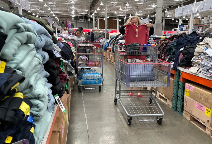 Shoppers buys clothes in costco store
