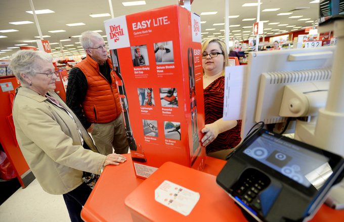 Customer checks out a Dirt Devil vacuum cleaner at Target