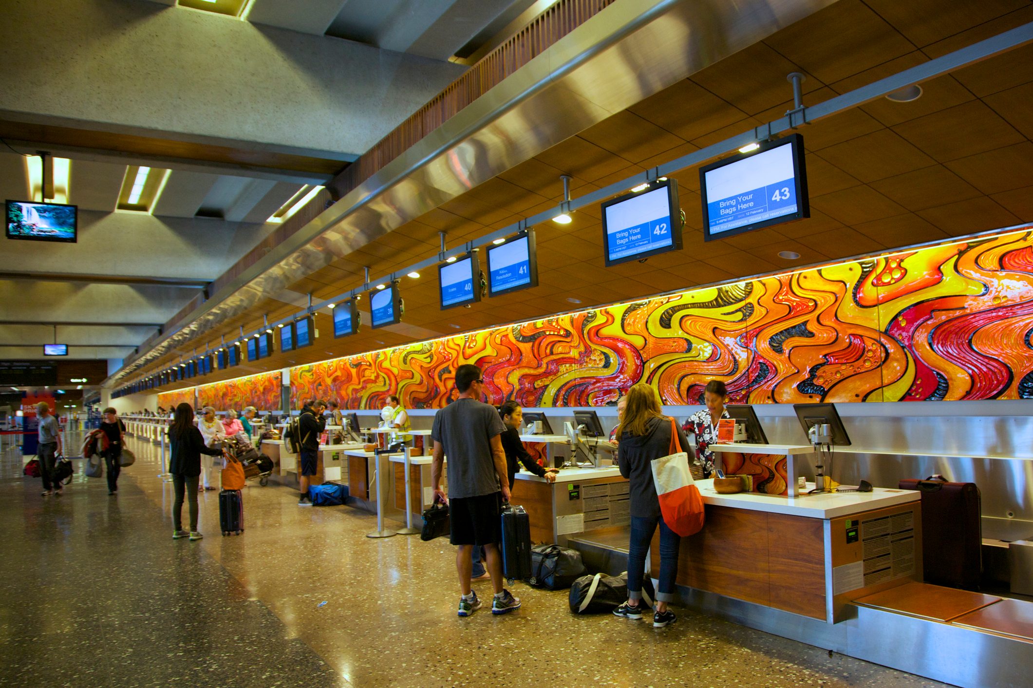 People at check-in at Honolulu airport