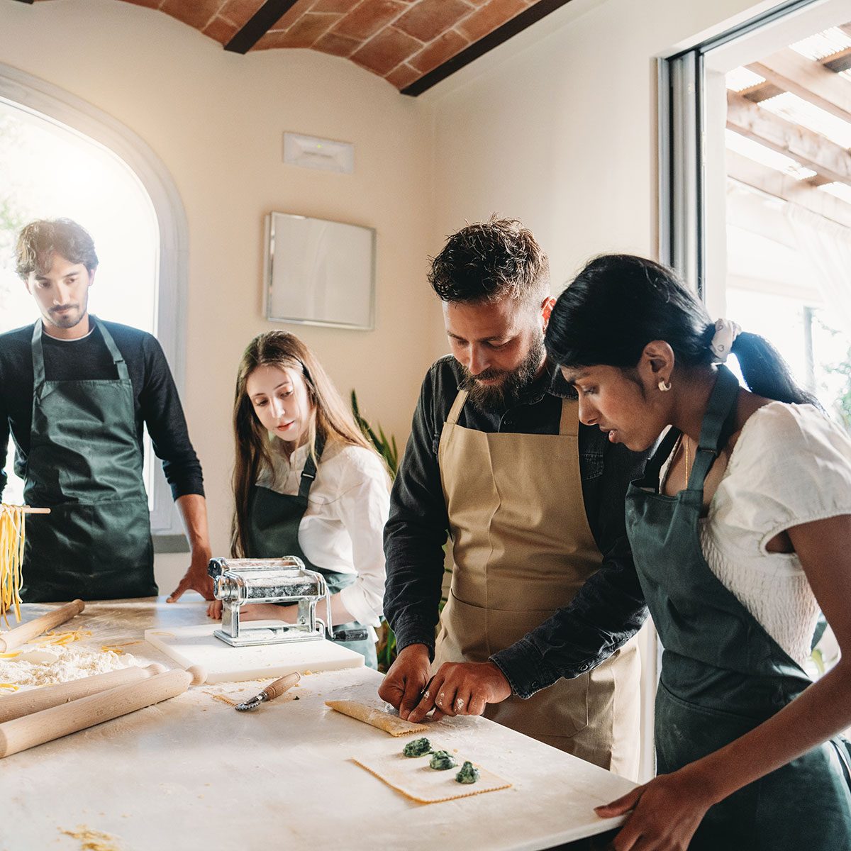 Chef trains students in cooking school