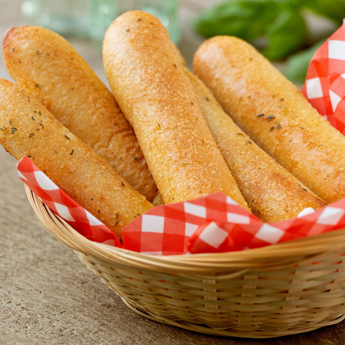 Breadsticks in a basket, ready to serve