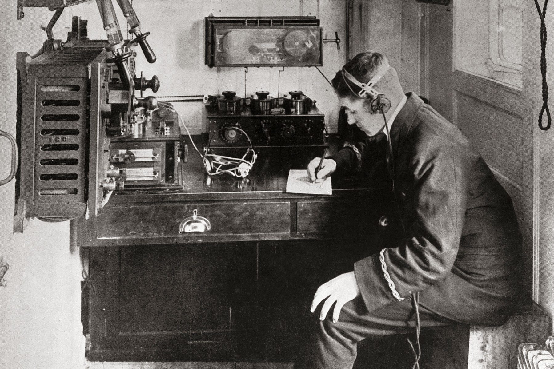 A re-enactment of the scene in the wireless room of the SS Carpathia where the liner's distress signals were first picked up by David Sarnoff.