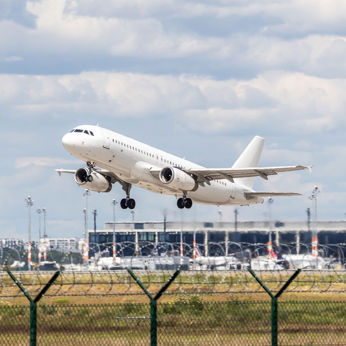 Airplane taking off at an airport