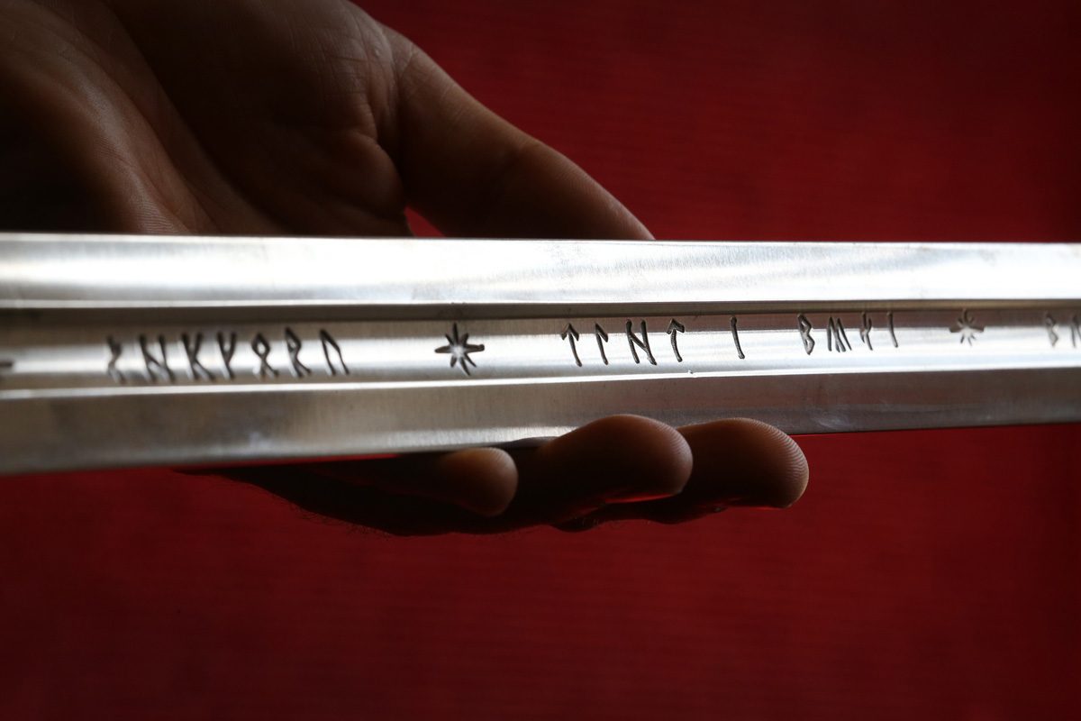 Elvish writing is seen on 'Anduril', a prop sword belonging to Aragorn, hero of 'The Lord of the Rings' movie trilogy