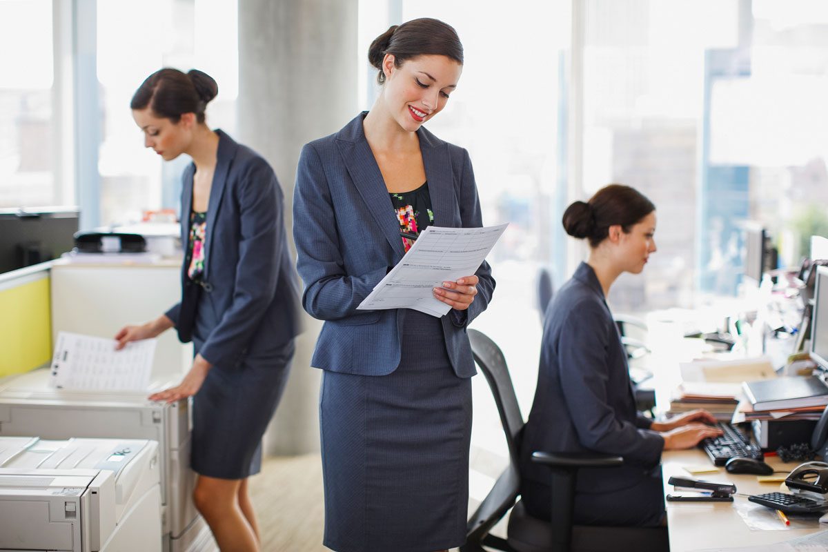 Sequence Of Businesswoman Working In Office