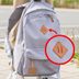 The Real Purpose Behind Those Diamond Patches on Backpacks