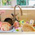 Here's the Gross Reason Why You Should Never Let Your Dishes Soak in the Sink Overnight